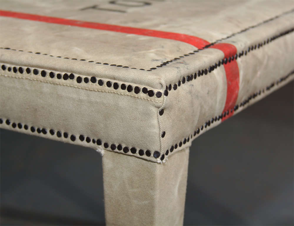 Wood custom bench/table upholstered in vintage Japanese mail bag