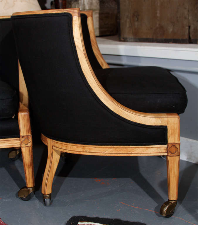 pair low cocktail chairs on casters at 1stdibs