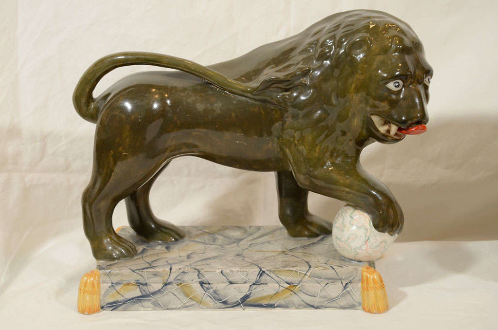 A Pair of Antique Staffordshire Lions