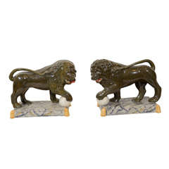 A Pair of Antique Staffordshire Lions