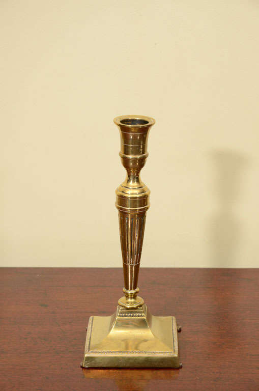 English brass candlestick, fluted center ending on square base