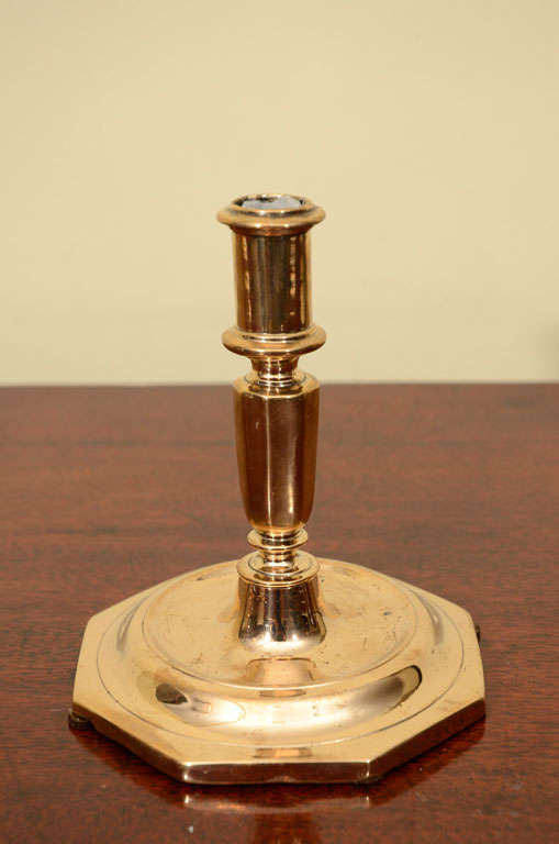 Small Dutch brass candlestick on octagonal base