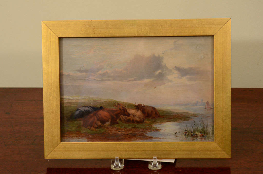 Small signed oil painting of cows resting