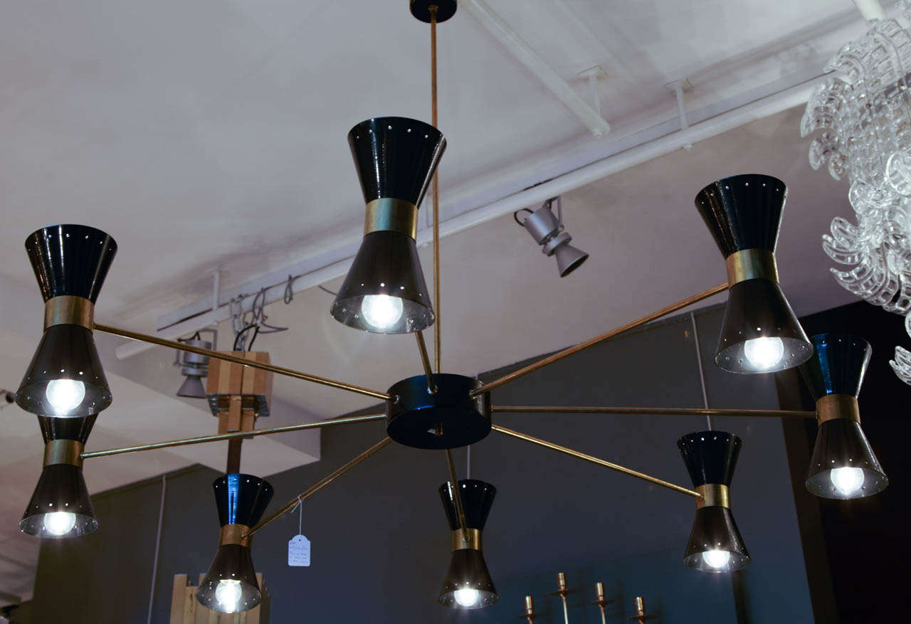 Pair of chandeliers in the style of Stilnovo, suspensions in black and golden metal, 8 arms of lights, double lighting