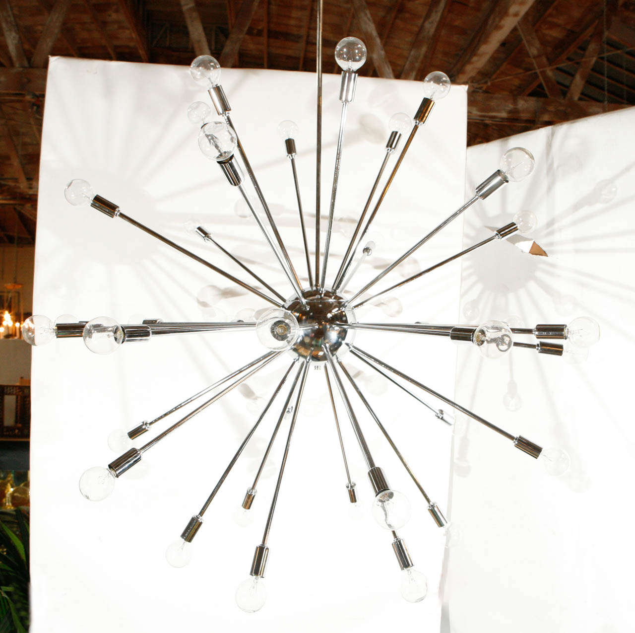 A spectacular thirty-six-light Sputnik chandelier. Chandelier is 36