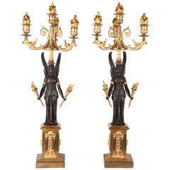 19th Century French Empire style Pair of gilt and patinated bronze candelabra