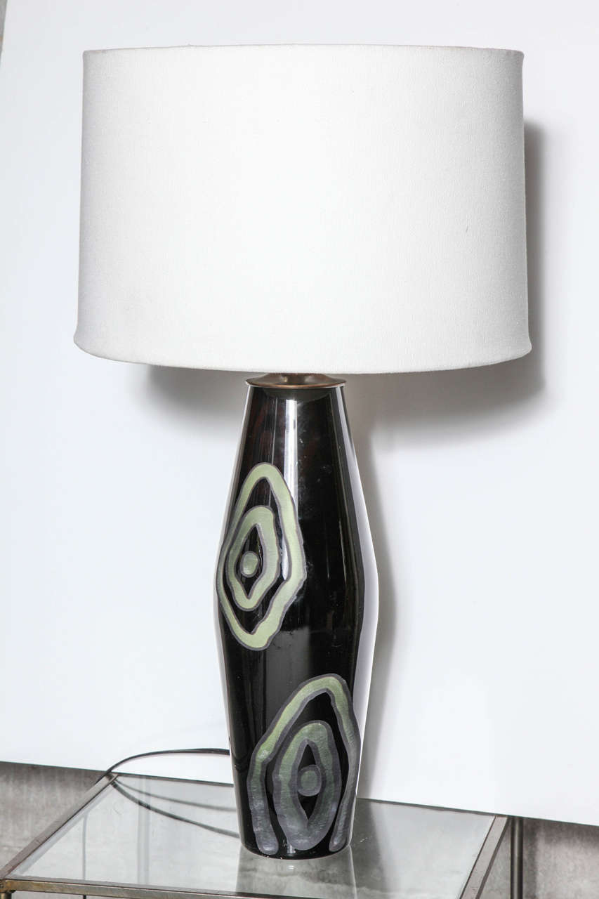 Etched design echos inverted hourglass lamp shape.  Base height is 16