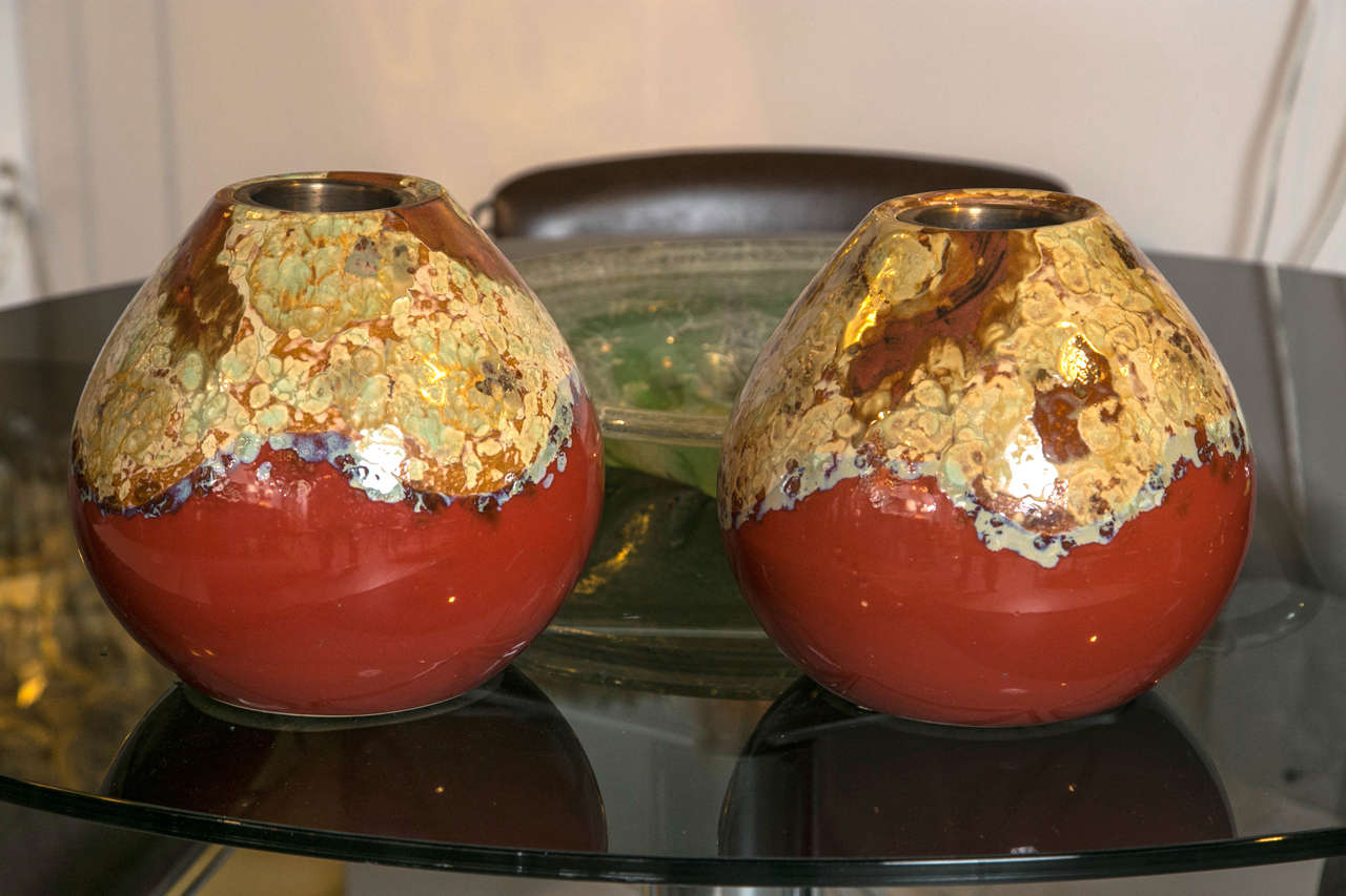 A pair of Mid-century glazed lava vases, with original copper inserts.