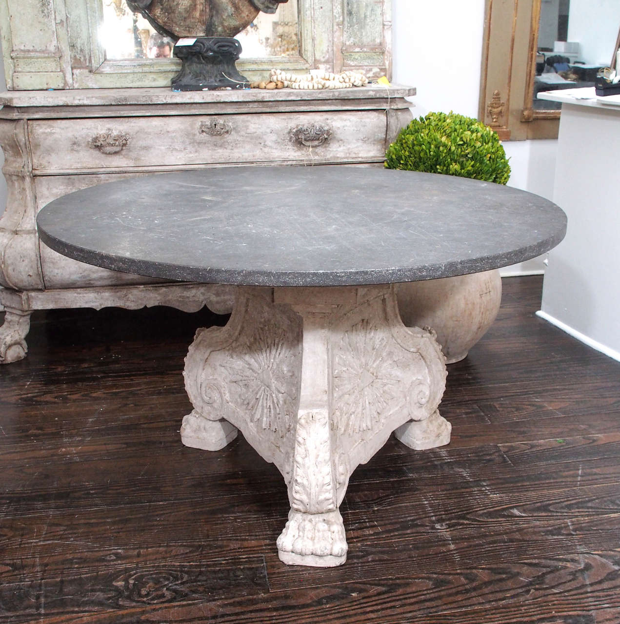 19th century carved and painted Italian blue stone center table with claw feet.
