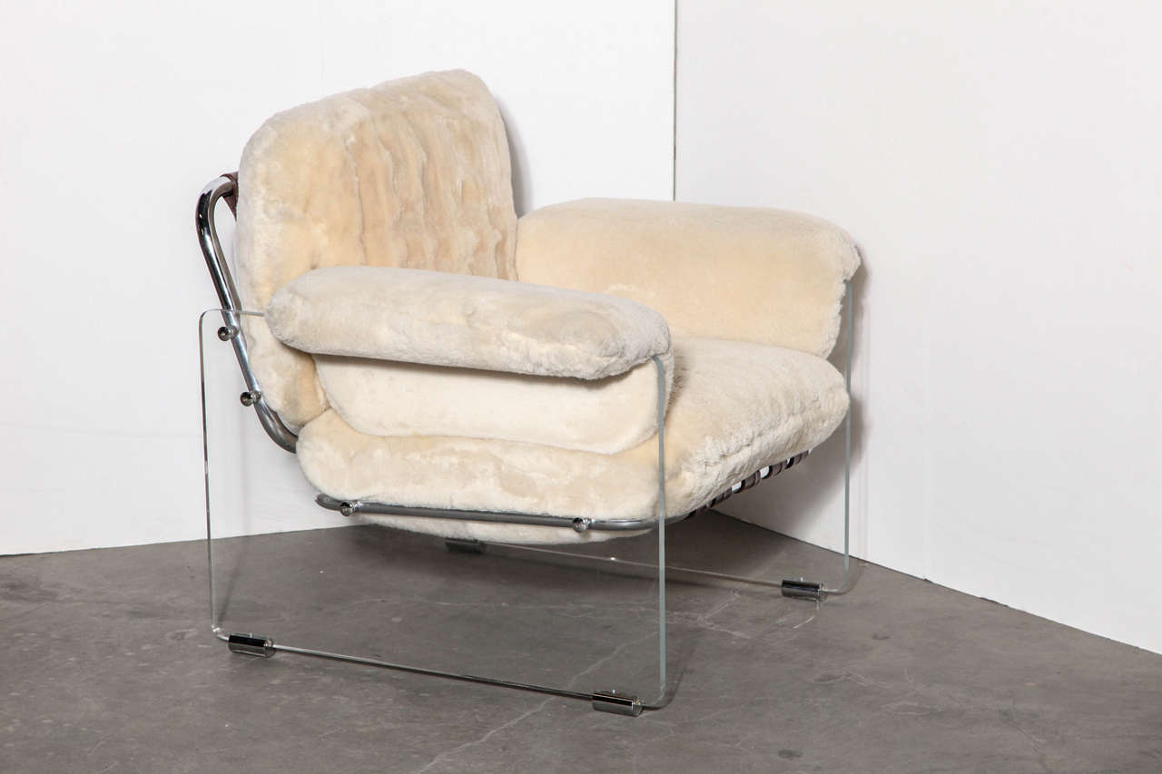 Pace Argenta lucite, chrome and leather floating club chair. Newly upholstered in ivory natural shearling.