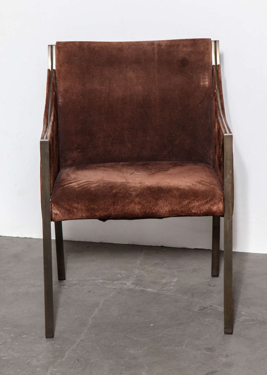 A fine pair of chairs from the 1960s in the original brown suede. Legs and frame are solid bronze; bronze detail along the arms.
