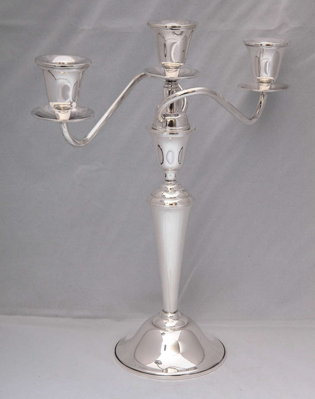 Pair of sterling silver candelabrum, International Silver Co., Wallingford, Ct., circa 1930s. Each candelabra will 