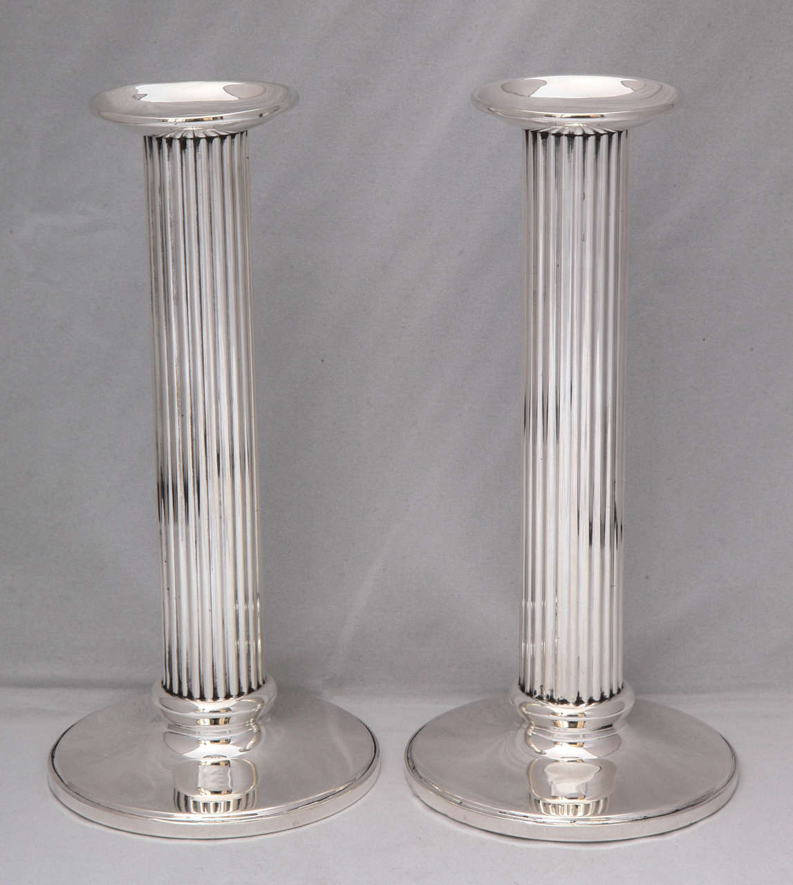 Pair of Edwardian, sterling silver, column - form candlesticks, Hamilton Silver Mfg. Co., New York, Ca. 1910. Columns are 