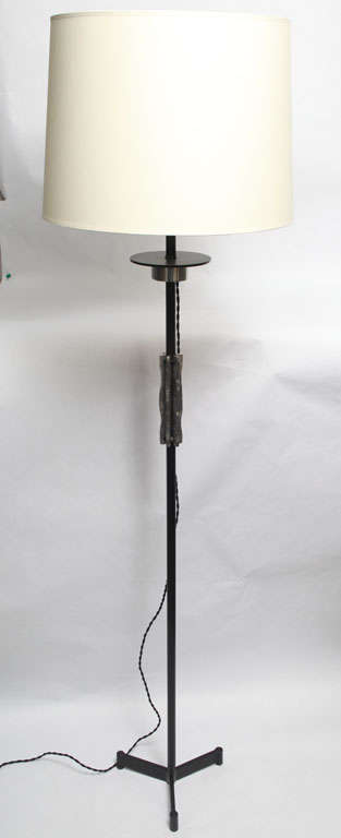 A pair of Italian 1950s architectural floor lamps.