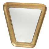A signed Hagenauer hammered brass mirror