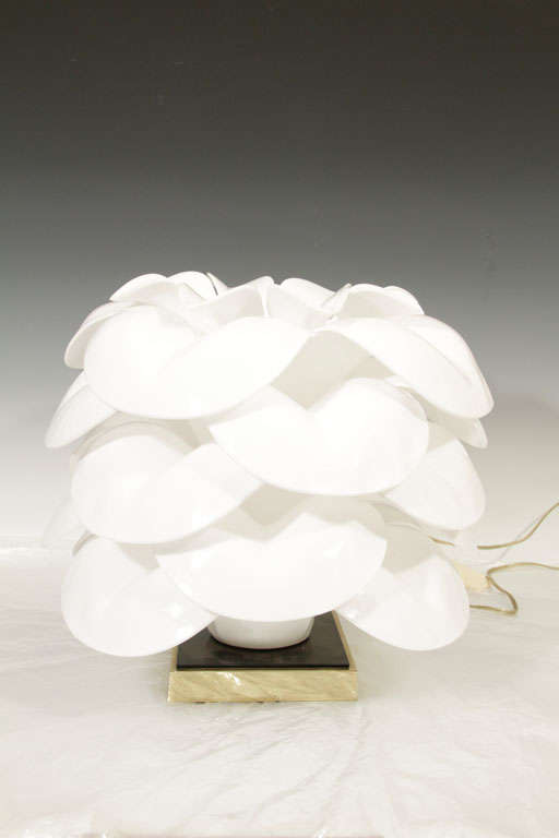 A whimsical flower petal lamp in white lucite, ca. 1970's, signed 