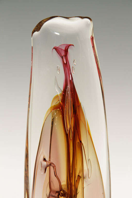 Studio art glass with internal mauve glass design in a smoke effect.