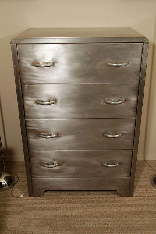 Vintage polished steel four drawer chest in the manner of Norman Bel Geddes.
