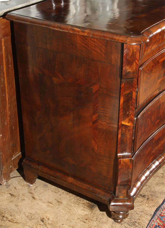 Early 1800's Italian commode from Genoa. With bracket corners, and burl and walnut veneer. The commode has been completely restored and French Polished.