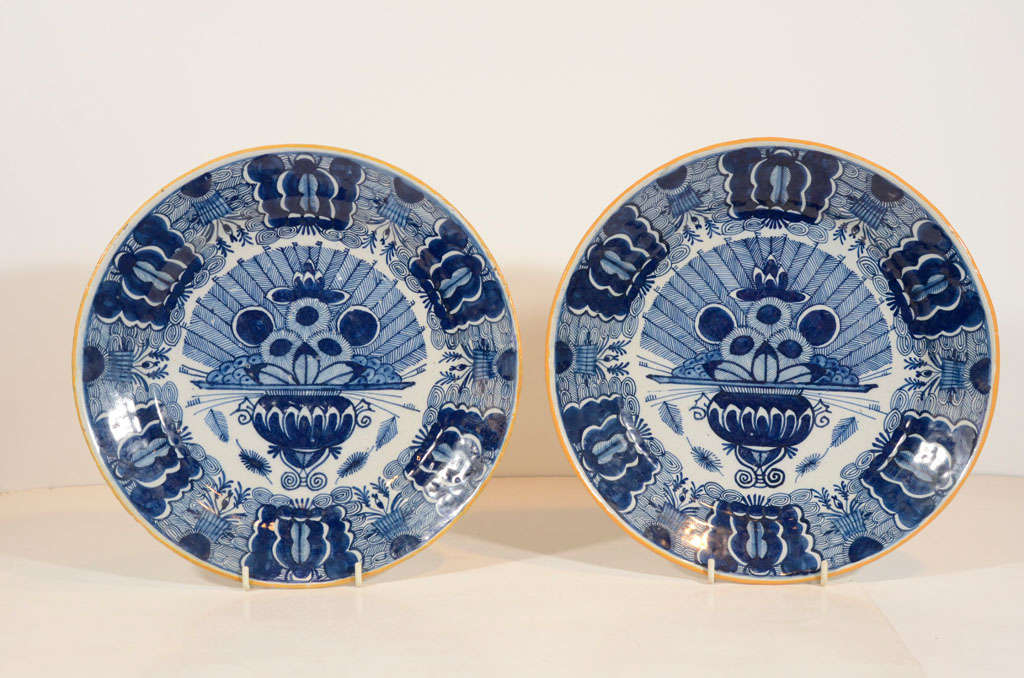 A Pair of Blue and White Dutch Delft "Peacock" Chargers