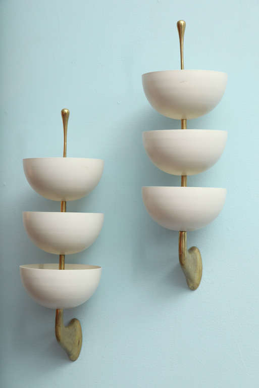 Elegant forms comprised of painted metal cups & polished brass stylized supports.  Each sconce has 9 candelabra sockets, making these a great source of light.  *To see our entire inventory, go to www.donzella.com