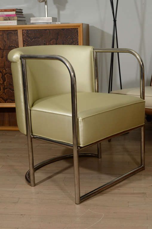 Curvaceous armchair by Louis Sognot upholstered in mint neoprene and nickel lated steel frame. Available for customization with COM.