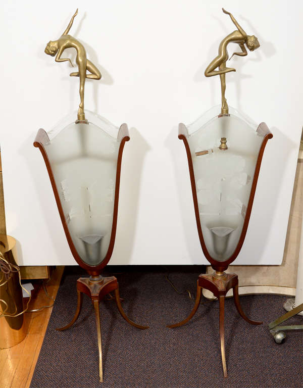 Amazing pair of rare and authentic Italian Art Deco fantasy table lamps in exotic wood and tripod bases. Each has inset etched glass panes depicting Exotic Bonsai motifs and a  Female bronze nude figure gracing the top.

