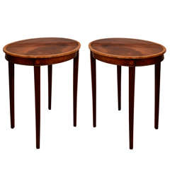 Pair of Oval Georgian Mahogany End Tables on Fluted Tapering Legs.