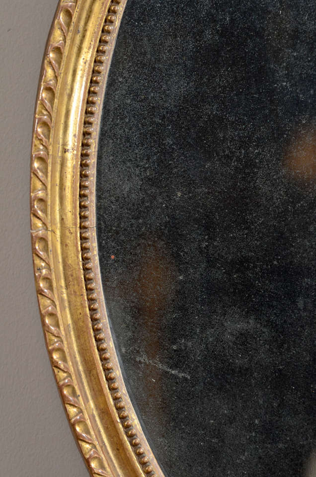 Gesso Pair of 18th Century English Oval Gilt Mirrors For Sale