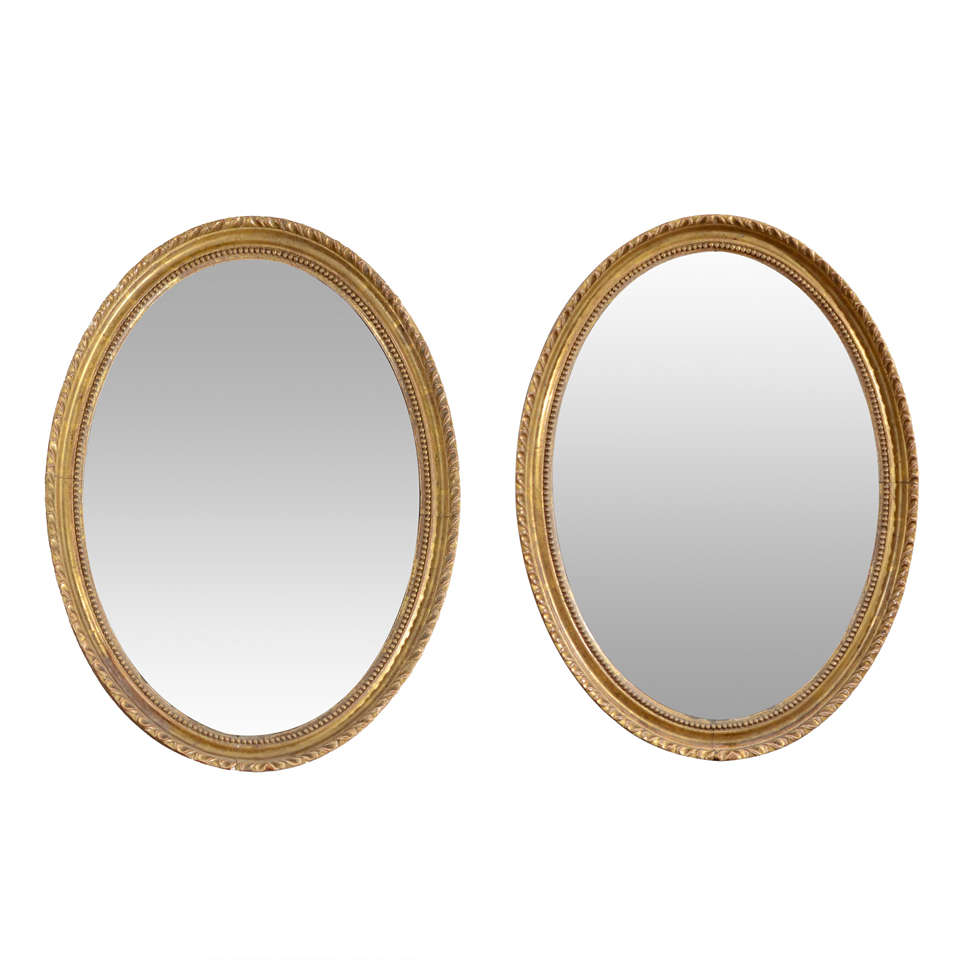 Pair of 18th Century English Oval Gilt Mirrors For Sale