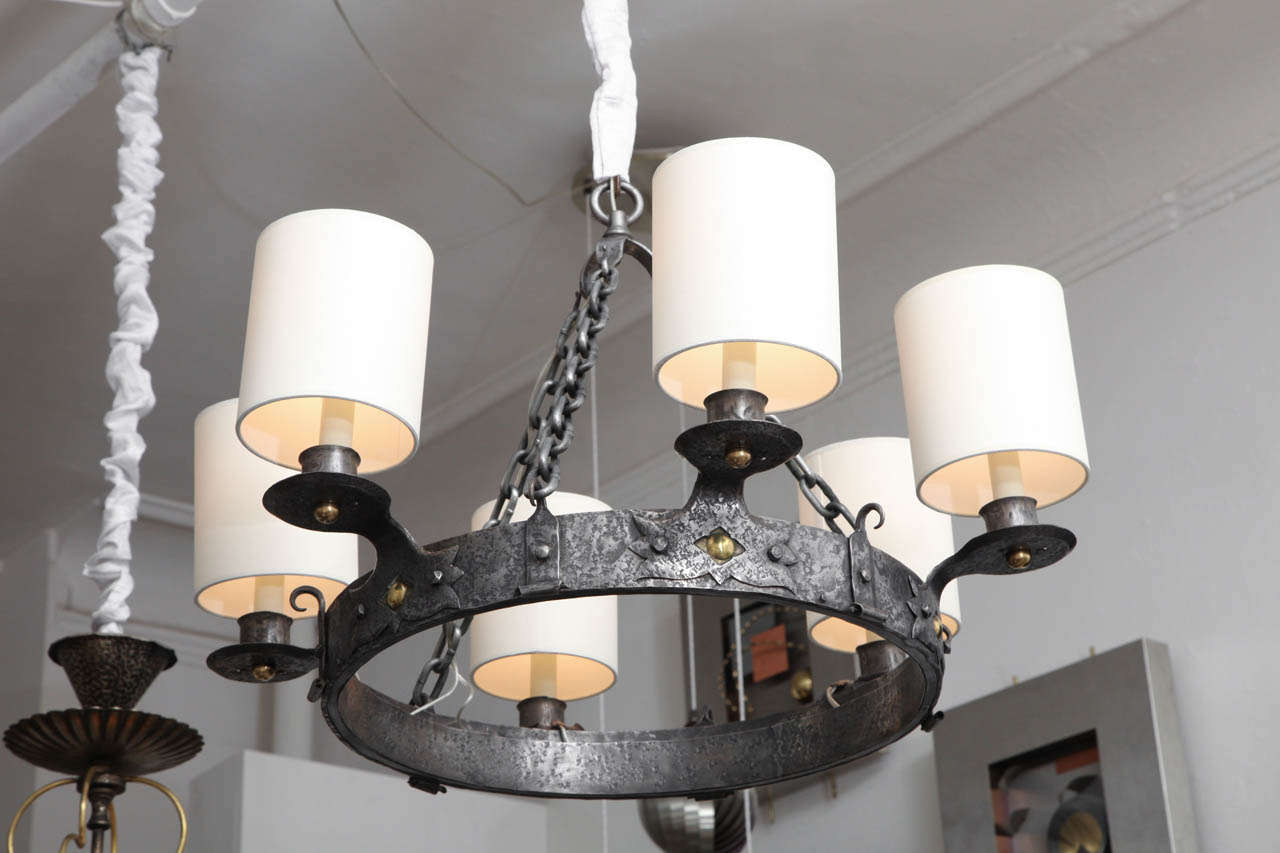 A Modernist 1920's Arts & Crafts wrought iron and brass ceiling fixture.