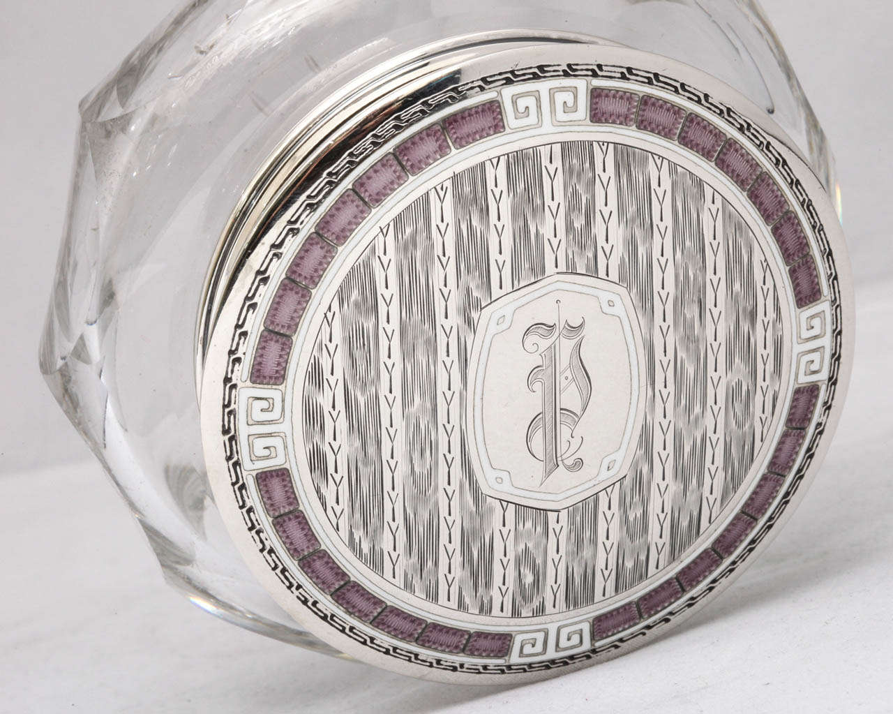 American Unusual Kerr Art Deco Powder Jar Mounted By a Sterling Silver and Purple and White Guiloche Enamel Lid