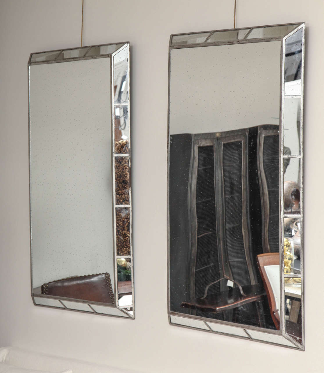 Pair of Mid-20th Century rectangular mirrors within canted silverwood frames