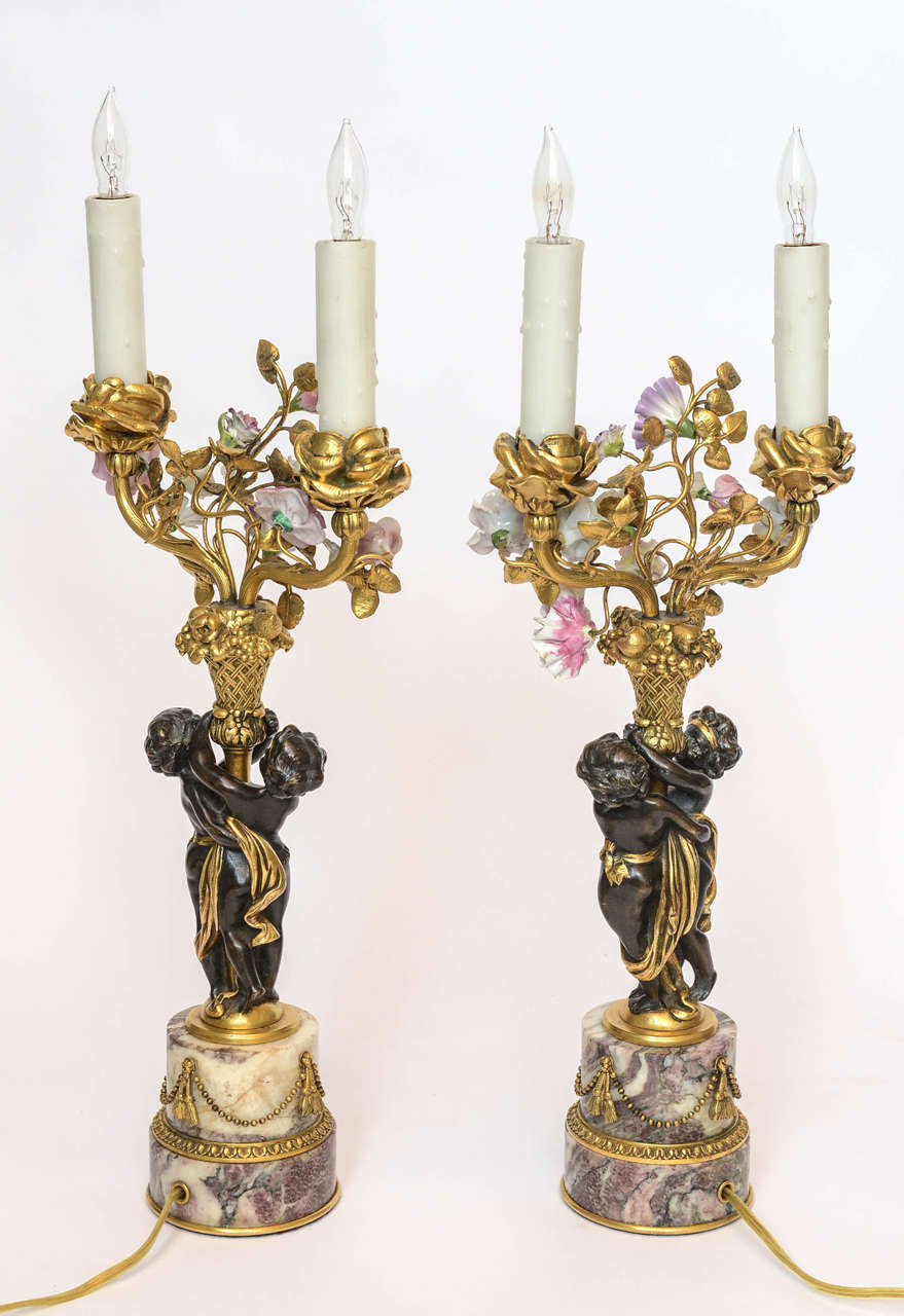 Pair of Children Holding Candelabra Mounted on Rouge Marble by E.F. Caldwell For Sale 1