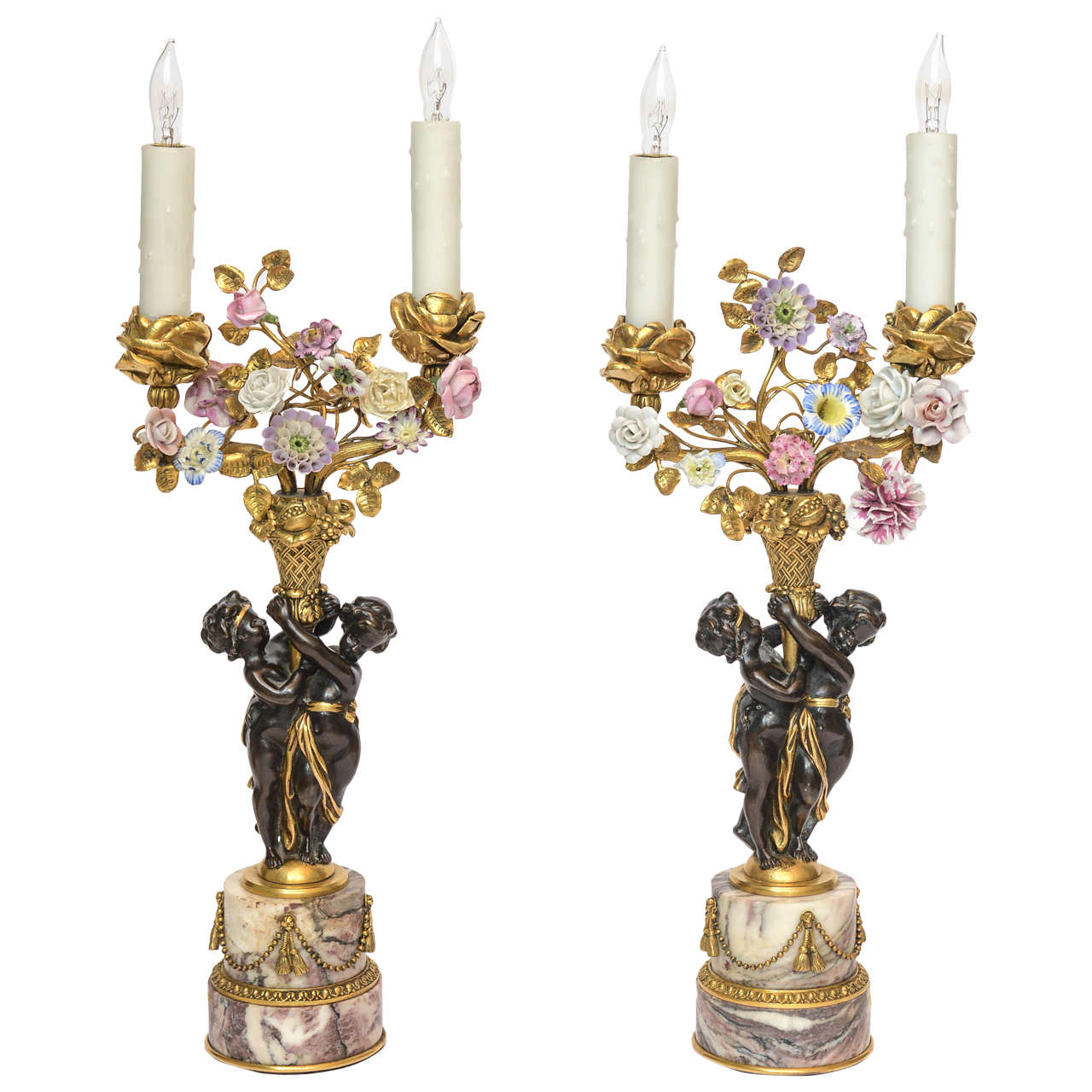 Pair of Children Holding Candelabra Mounted on Rouge Marble by E.F. Caldwell For Sale