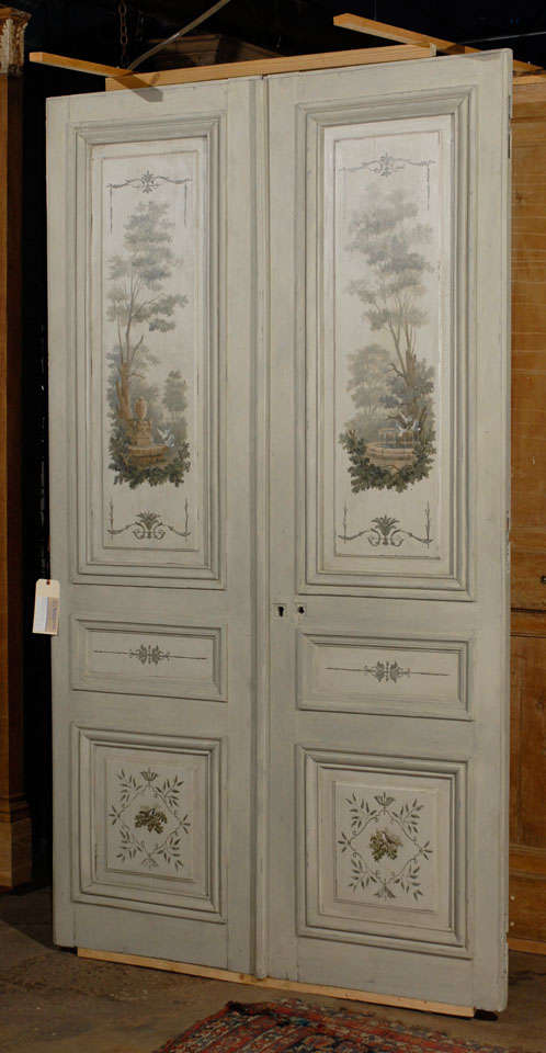 Pair of period 19th.c French Louis XVI doors from the centre of Paris with later painted finish including hand-painted panels, showing doves congregating around fountains,obverse. 