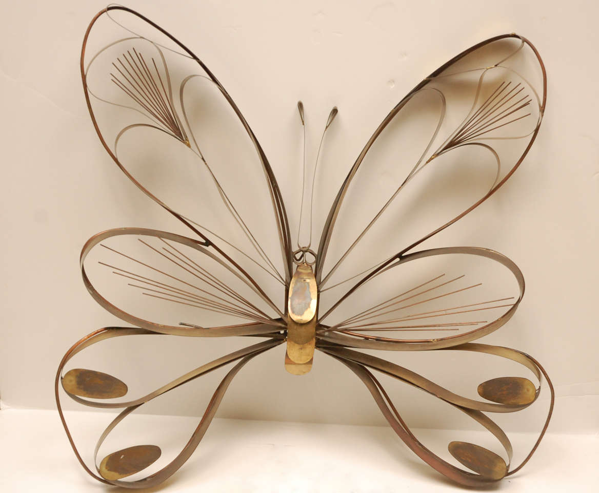 Midcentury brass wall sculpture attributed to Curtis Jere.