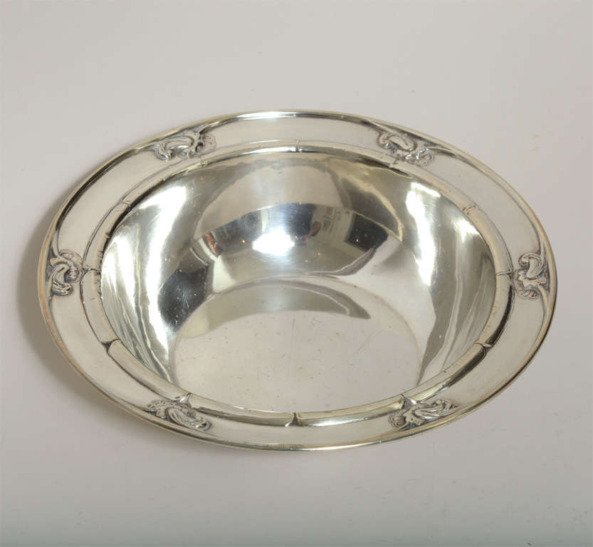 Sterling silver vegetable dish with stylized blossom border by Georg Jensen (1866-1935), Copenhagen.
 Hallmarks: Georg Jensen mark for post 1945/ 228 D/ DENMARK/ STERLING

Variety of other silver dishes available.

(Price shown is reduced price, no