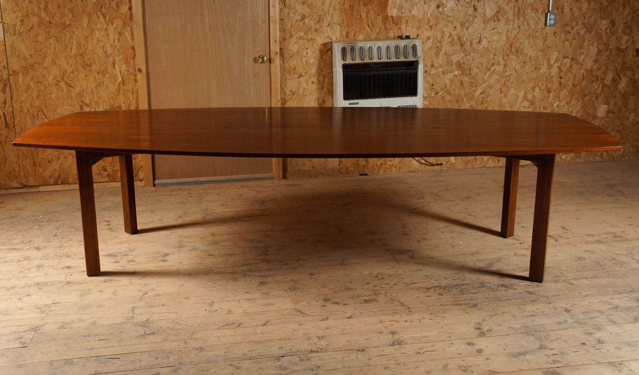 A handsome and extremely versatile walnut table designed by Jens Risom.
Sturdy, substantial and beautifully designed.