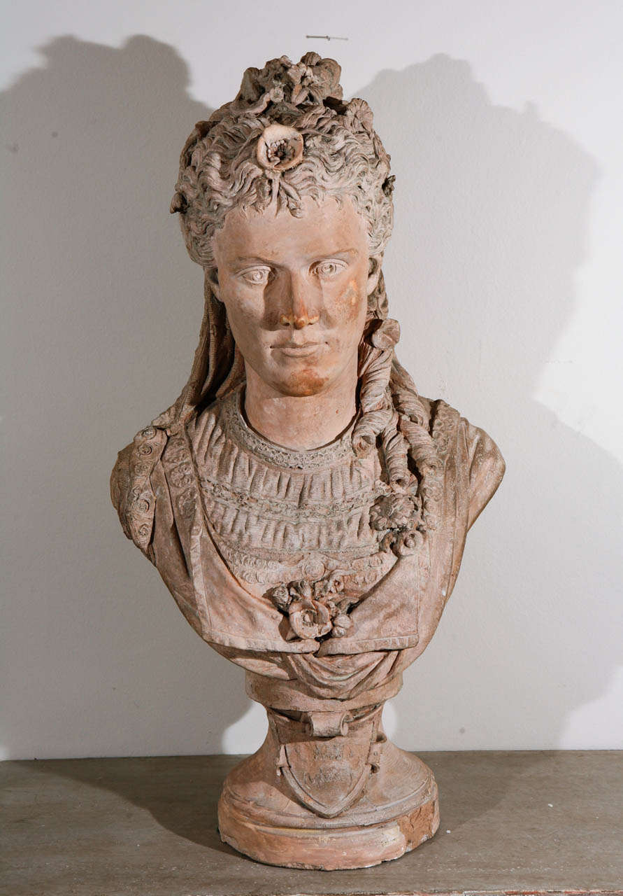 Hand made French terra cotta bust of Ophelia. In beautiful condition. Signed on the shield in the lower front.