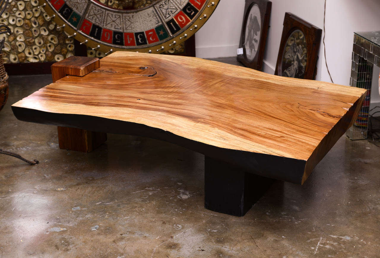 Three piece wooden slab table in the style of George Nakashima.