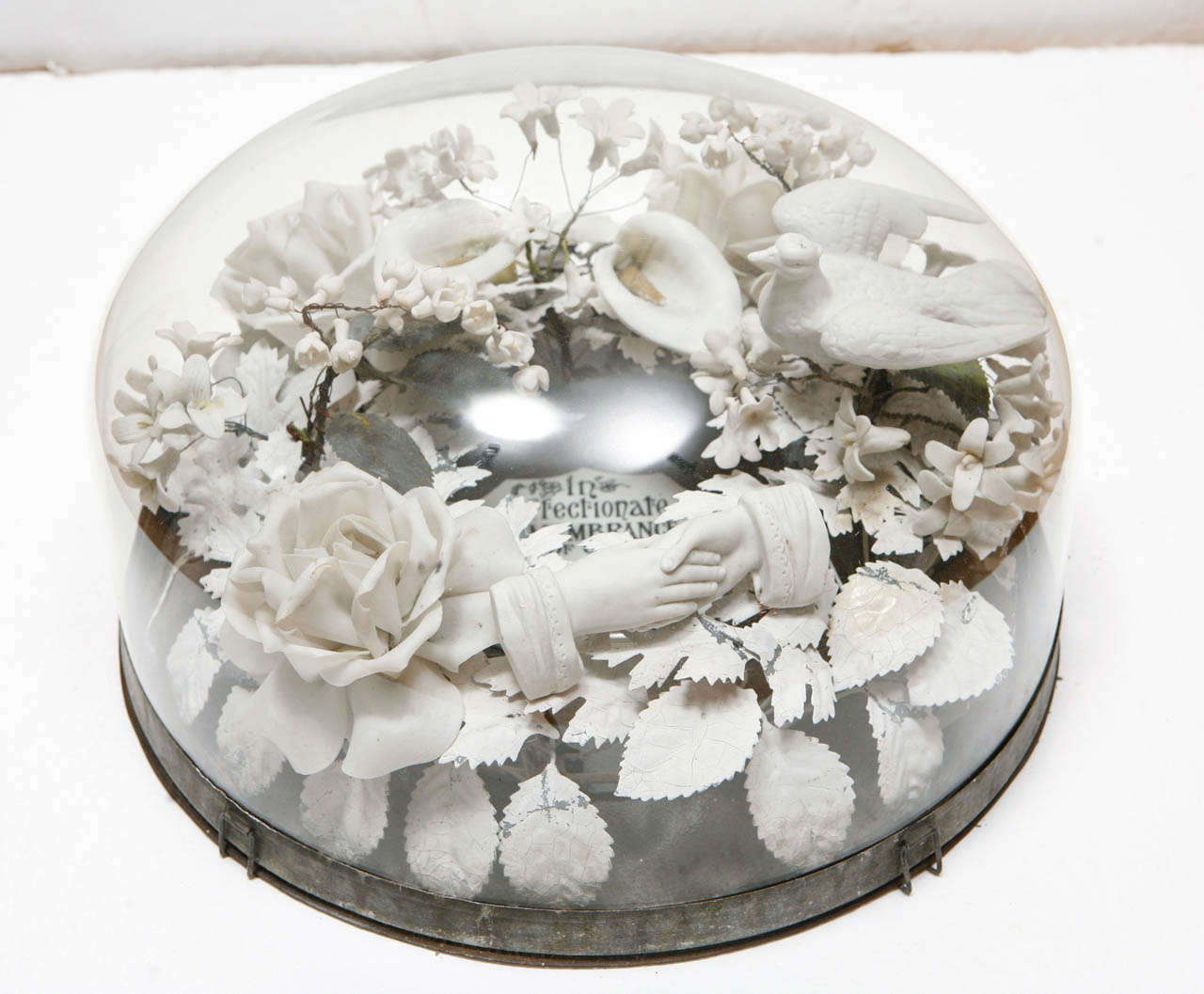 Antique English tole memorial wreath under glass dome.  Bisque birds, flowers, hands and painted porcelain plaque, too.  The plaque reads 