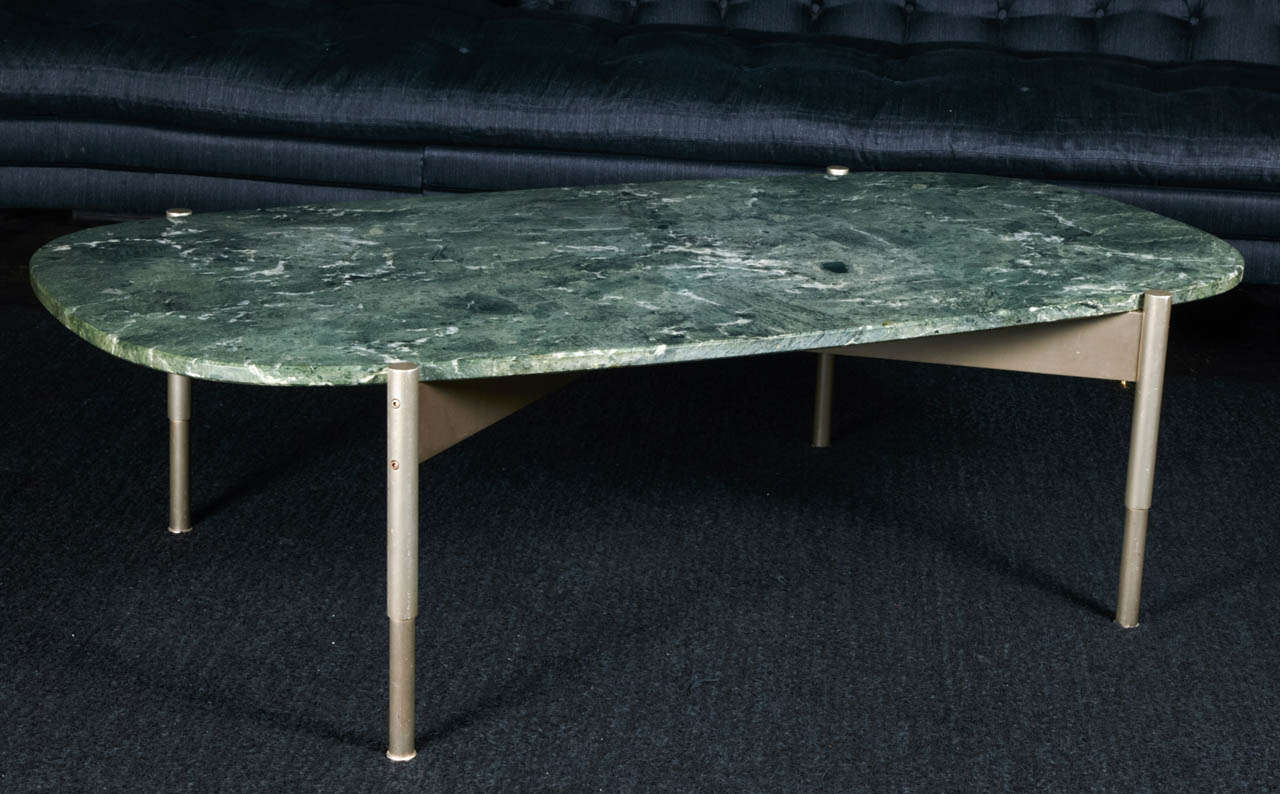 Coffee table designed for the Parco del Principi in Rome in 1964 by Gio Ponti, Quadripode legs in anodized brushed aluminium made of telescopic shape cylinders. They hold two crossbar blades supporting the green oval marble top. The original marble