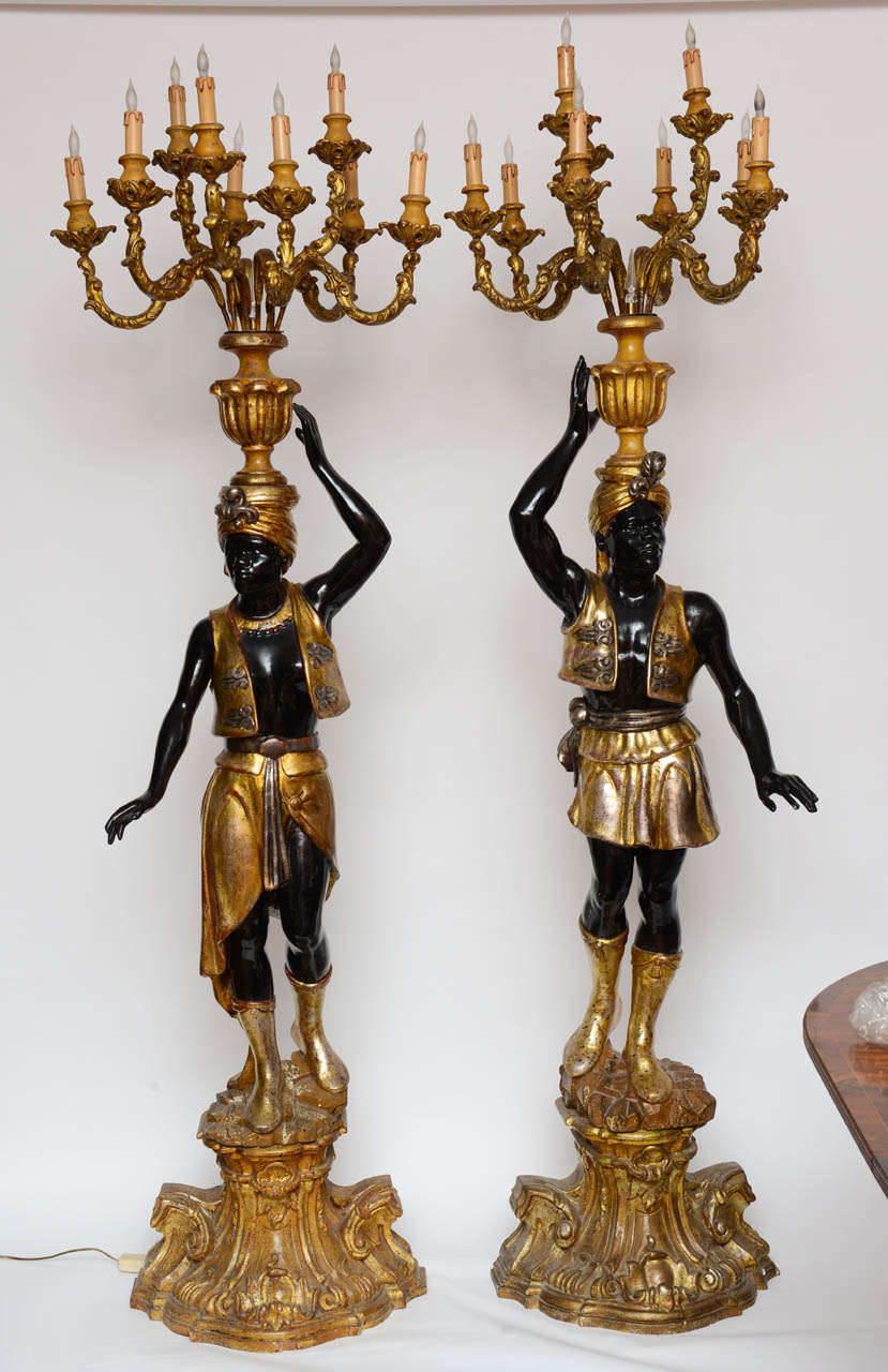 Unique pair of Black-a-Moors, male and female, beautifully carved and detailed, wired, original restored condition.

Originally $ 15,000.00

CHECK OUR INVENTORY FOR ADDITIONAL SALE ITEMS

The blackamoor is typically male, depicted with a head