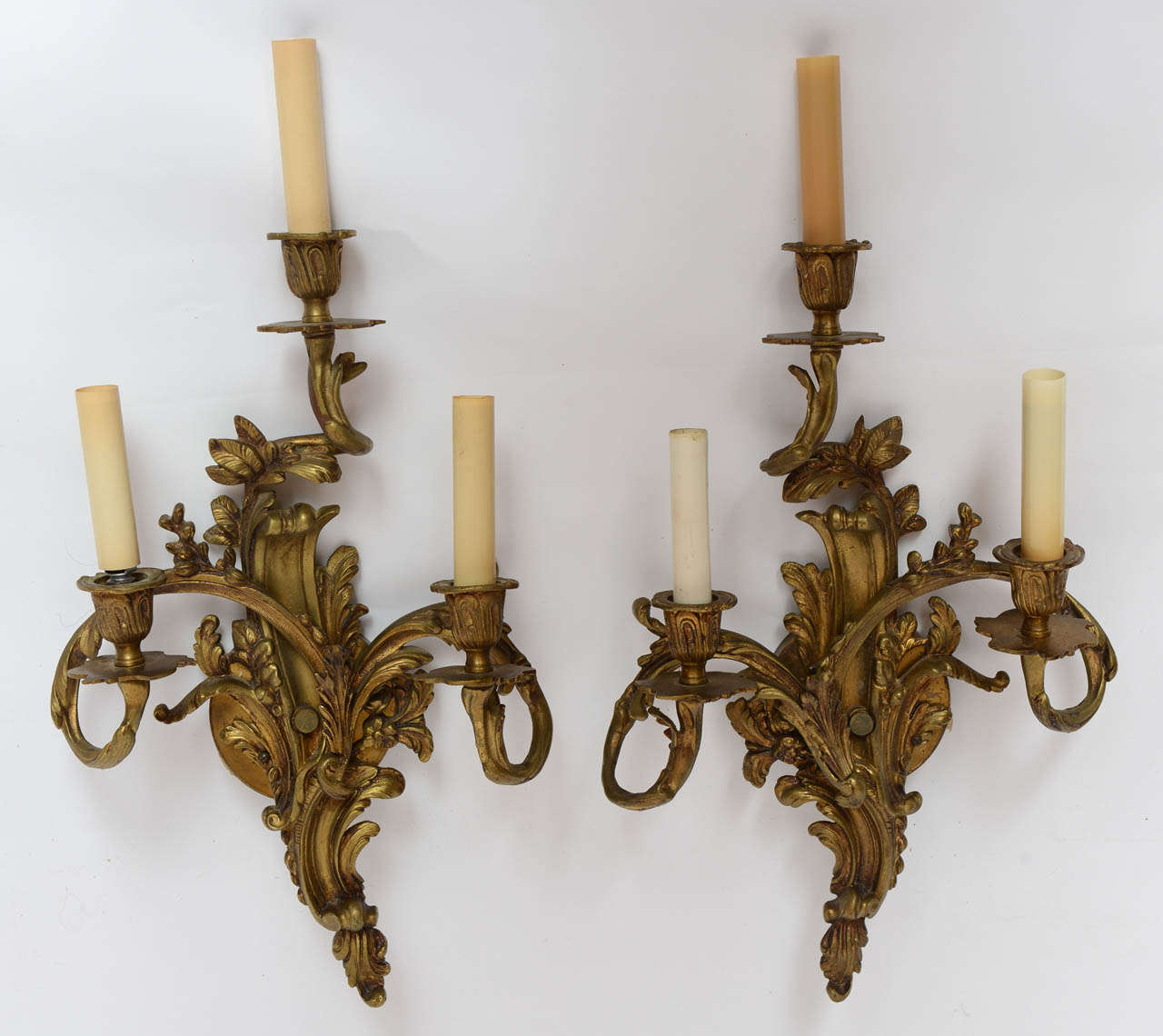 Pair of Louis XV Style Bronze Wall Sconces, each with three candle arms