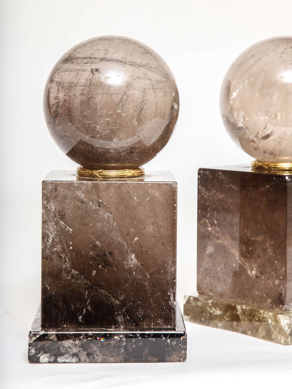 Hand-Carved Pair of French Smokey Rock Crystal Orbs or Spheres on Plinths with Gilt Bronze For Sale