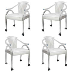 1970s Set of Four Lucite Rolling Chairs in the Style of Hollis Jones