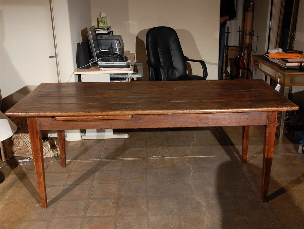 Beautifully Patinated and Distressed 18th C. French Farm Table with Pull-Out Cutting Board and Drawer