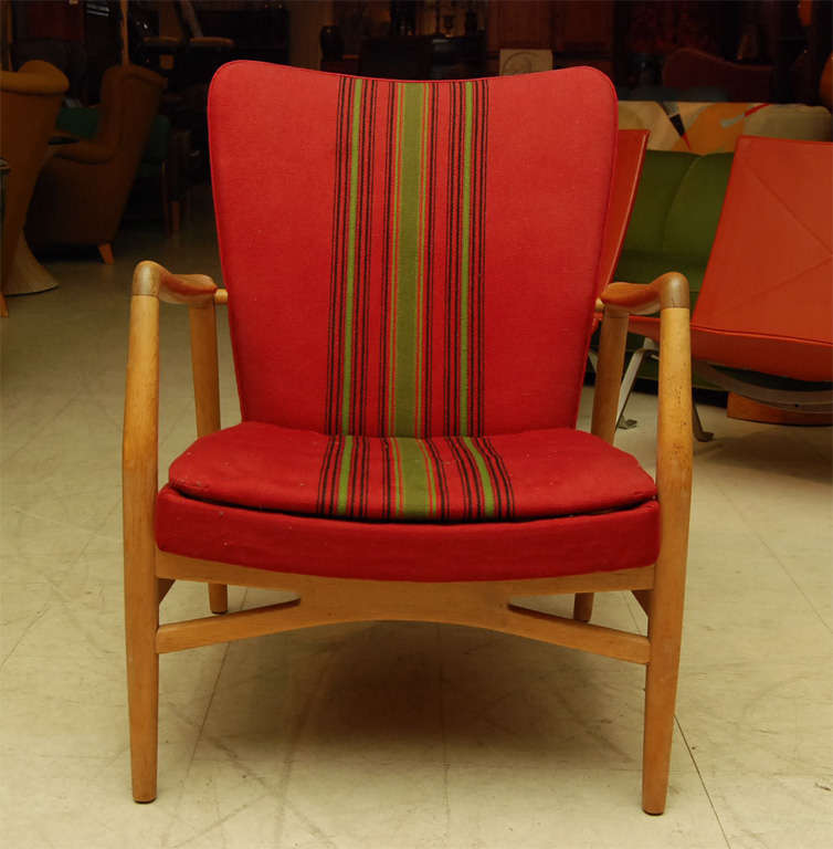 Danish modern armchair by Kurt Olsen, in the original striped red fabric, with oak frame, mid-century modern