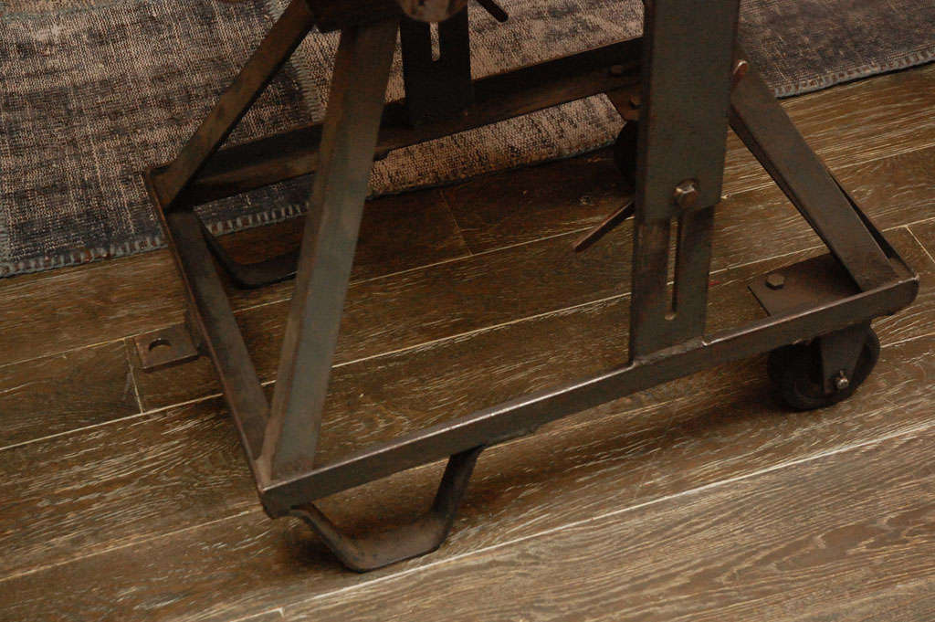 20th Century An iron adjustable industrial Scissor Table